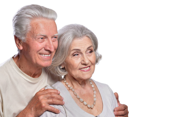 Portret van gelukkige senior paar op witte achtergrond - Foto, afbeelding
