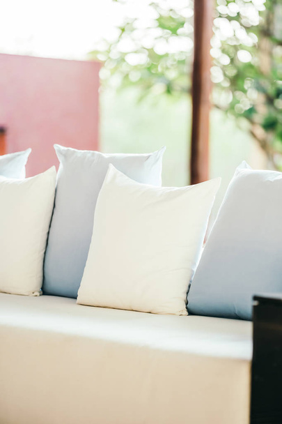 Beautiful luxury comfortable pillow on sofa decoration in living - 写真・画像