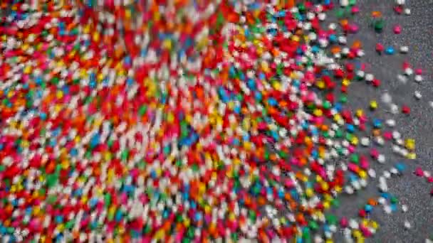 Colorido de bola de azúcar en fondo abstracto de cámara lenta
 - Imágenes, Vídeo