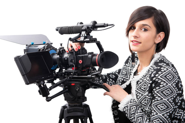 young woman with professional video camera, SLR, on white - Фото, зображення