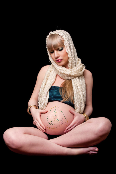 Pregnant woman holding belly - Foto, Imagem