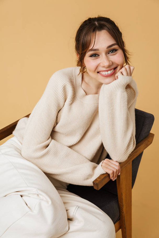 Beautiful young woman wearing sweater relaxing - Φωτογραφία, εικόνα