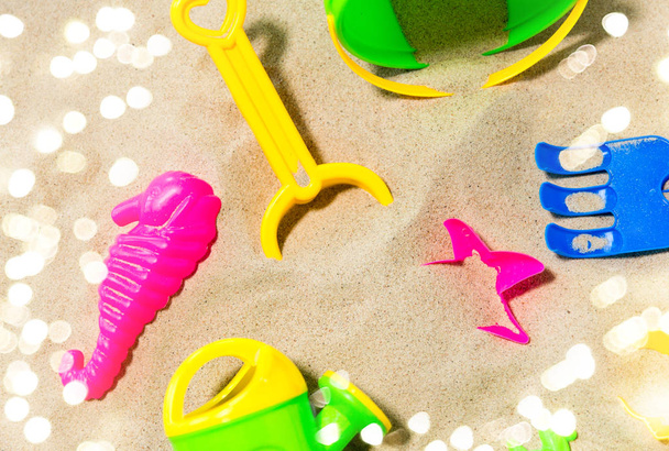 close up of sand toys kit on summer beach - Foto, Imagem
