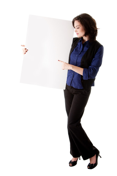 Young business woman with white board - Foto, Bild