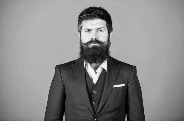 His designs are in demand. formal fashion. Stylish PR-specialist. Mature hipster with beard. PR-specialist. brutal caucasian hipster with moustache. Bearded man PR-specialist. Businessman in suit - Photo, image