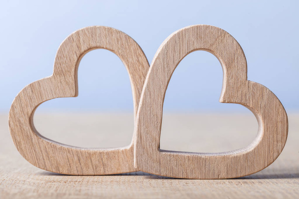 two wood hearts simbol of love - 写真・画像