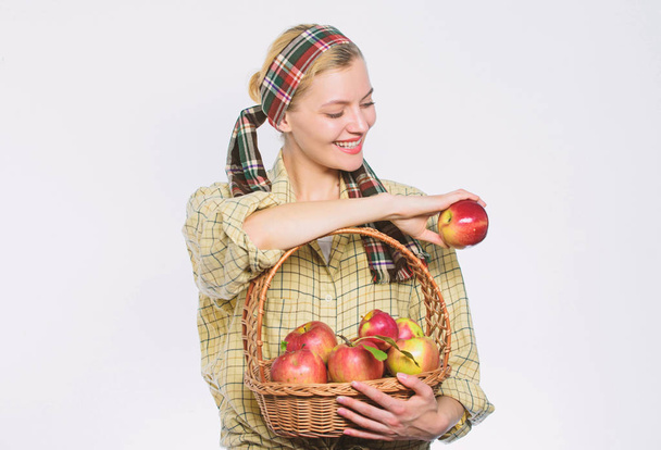 vitamin and dieting food. organic and vegetarian. healthy teeth. orchard, gardener girl with apple basket. Happy woman eating apple. spring harvest. summer fruit. Only the best fruits and vegetables - Foto, Imagem