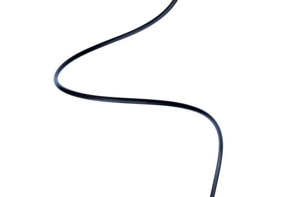 Černý drátěný kabel izolovaný na bílé abstrakci. - Fotografie, Obrázek