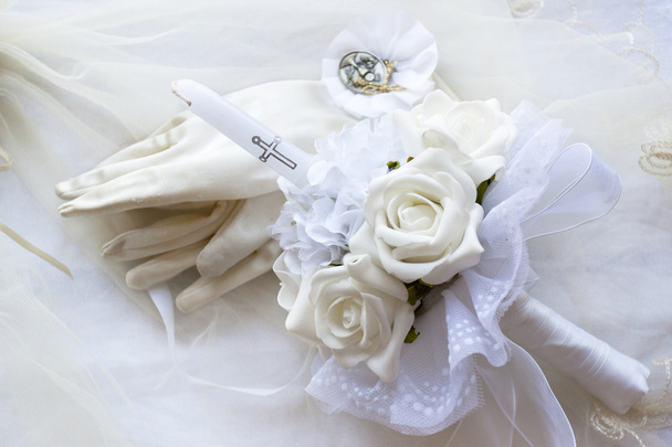 First holy communion candle gloves and medal - Photo, Image