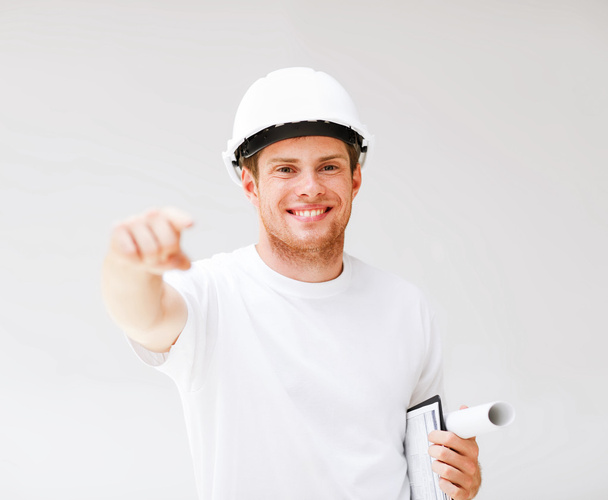 Male architect in helmet pointing at you - Φωτογραφία, εικόνα