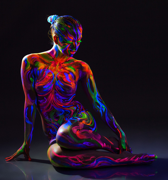 Image of strange glowing naked girl - Фото, изображение