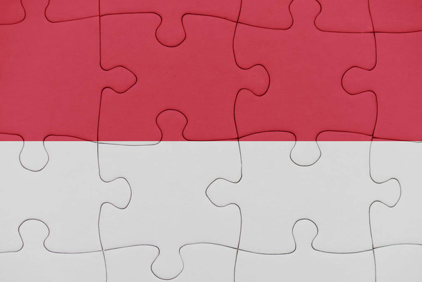 puzzle a nemzeti zászló Monaco . - Fotó, kép