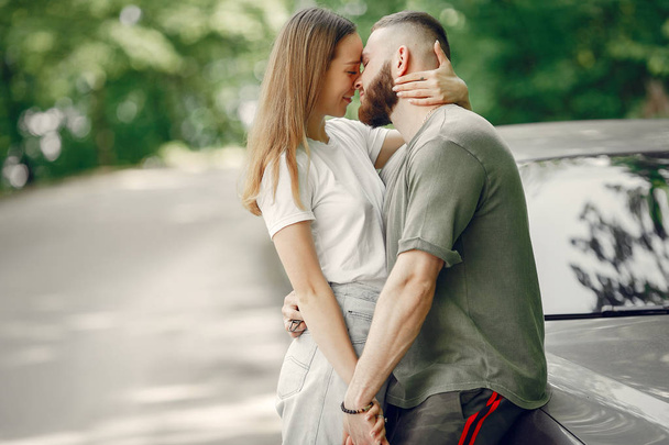 Beautiful couple spend time on a summer forest - Photo, Image