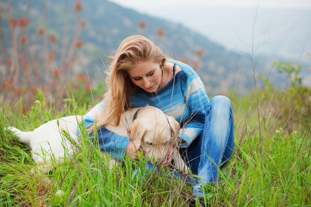 Girl with her dog - Fotó, kép