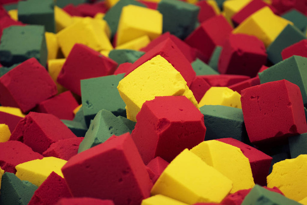 Abstract large colored soft foam blocks red, yellow and green - Fotografie, Obrázek
