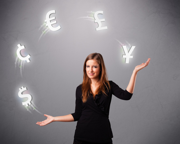 young lady standing and juggling with currency icons - Foto, immagini
