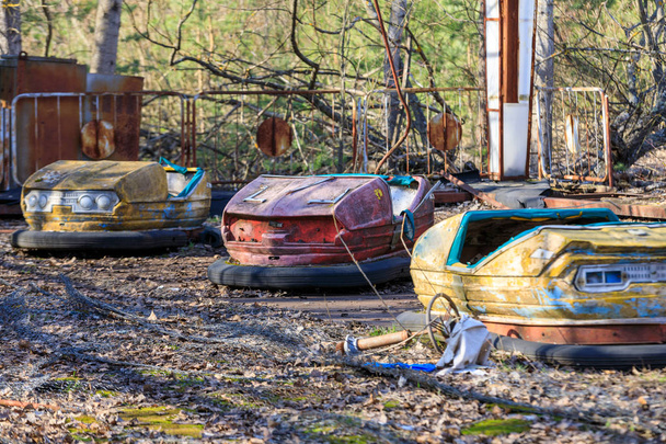 Eastern Europe, Ukraine, Pripyat, Chernobyl. Bumper cars at amusement park. - Photo, Image