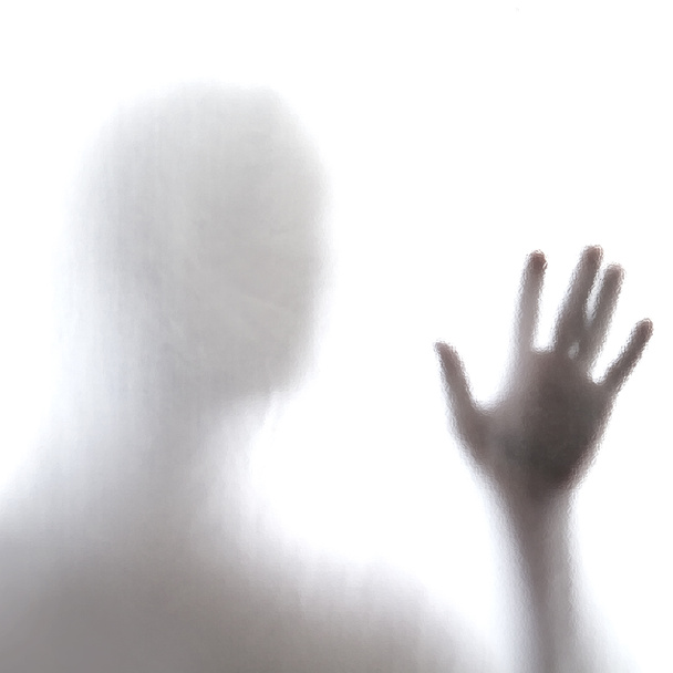 Man standing behind frosted glass - Foto, imagen