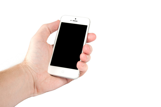 Ember kezében egy mozgatható telefon - Fotó, kép