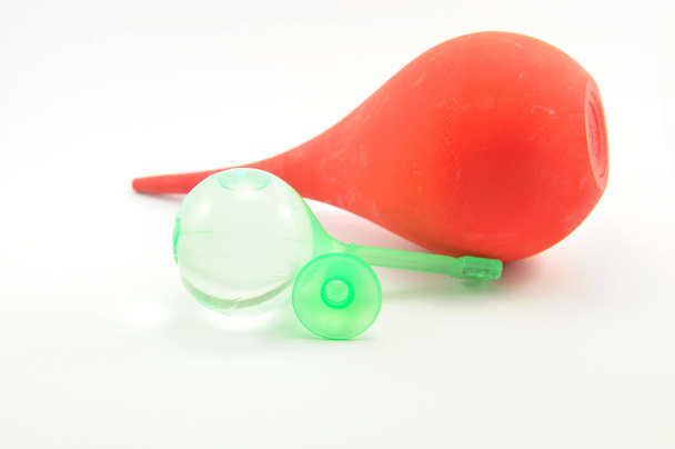 κόκκινο syring μπάλα και κλύσμα - Φωτογραφία, εικόνα