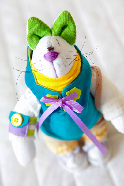 Handmade toy. Doll of textiles, fabrics and yarn. Cat sewn by ha - Фото, изображение