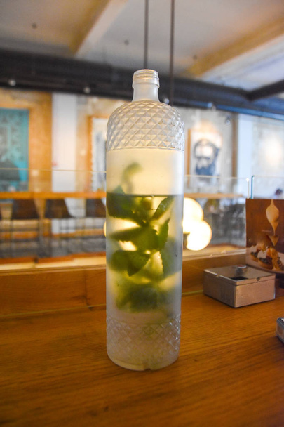 Mint water. decorative bottle inside - Photo, Image