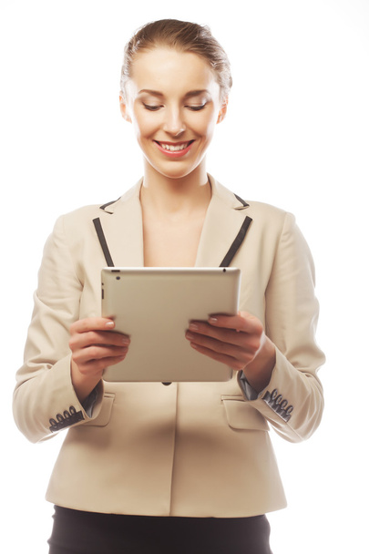 Business woman uses a mobile tablet computer - 写真・画像