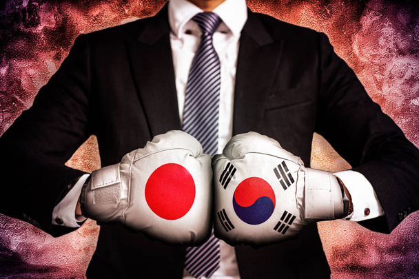 Πολιτική και επιχειρηματική έννοια του εμπορικού πολέμου μεταξύ Κορέας και ja - Φωτογραφία, εικόνα