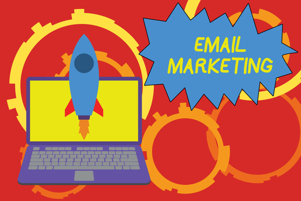 Conceptual hand writing showing Email Marketing. Business photo showcasing Sending a commercial message to a group of showing using mail Launching rocket up laptop Startup Developing goal objective. - Photo, Image