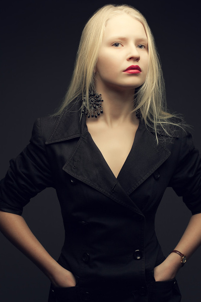 Portrait of a beautiful fashionable model with natural blond hai - Fotó, kép