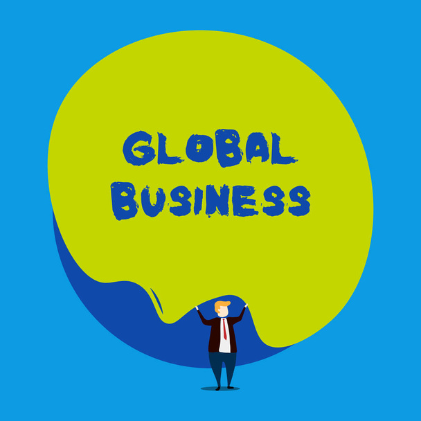 Conceptual hand writing showing Global Business. Business photo showcasing Trade and business system a company doing across the world Male human wear formal tuxedo hold asymmetrical shape bubble. - Photo, Image