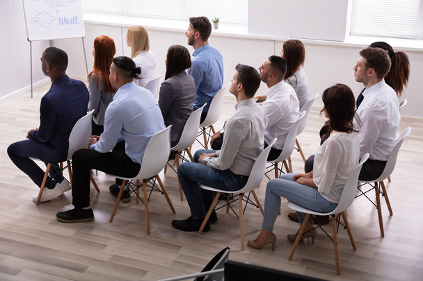 Diverse Group Of Successful Business People Sitting On Chair In The Conference Room - 写真・画像