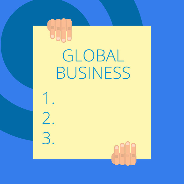 Writing note showing Global Business. Business photo showcasing Trade and business system a company doing across the world Two hands holding big blank rectangle up down Geometrical background. - Photo, Image
