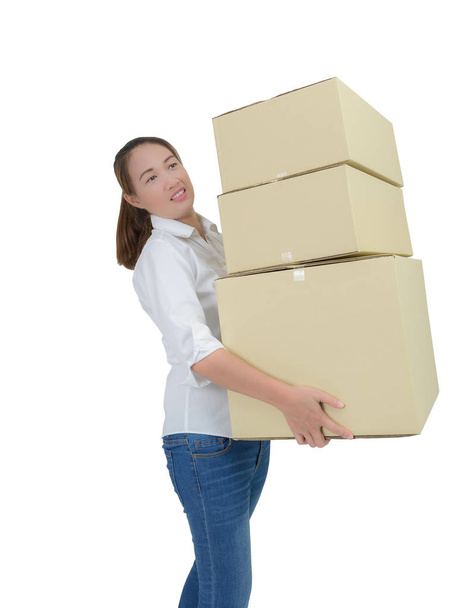 woman carrying and lifting boxes - Фото, изображение
