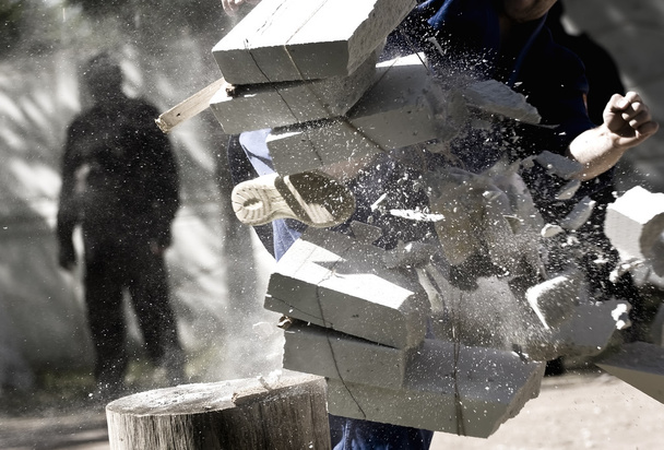 Breaking bricks on karate competition - Photo, Image