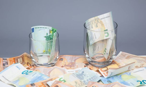 Euro banknotes used in the European Community. Legal use money for the purchase of service goods, objects, to be able to pay in the market. The banks use it to give loans to companies and people. Money is the engine of the world - Photo, Image
