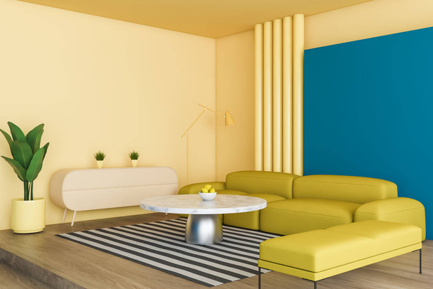 Helder gele en blauwe woonkamer hoek - Foto, afbeelding