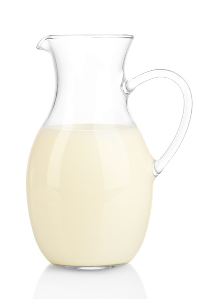 Milk in jug isolated on white - Фото, зображення