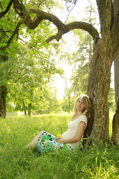 young pregnant woman on nature - Photo, image