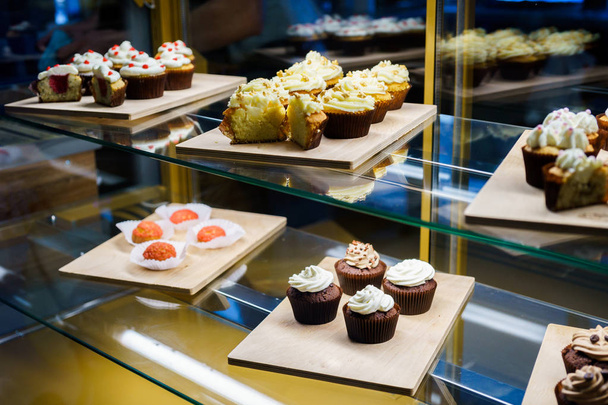 many beautiful cakes on a tray - Foto, imagen