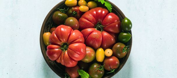 banner of multicolored tomatoes of different colors, shapes and  - Photo, image
