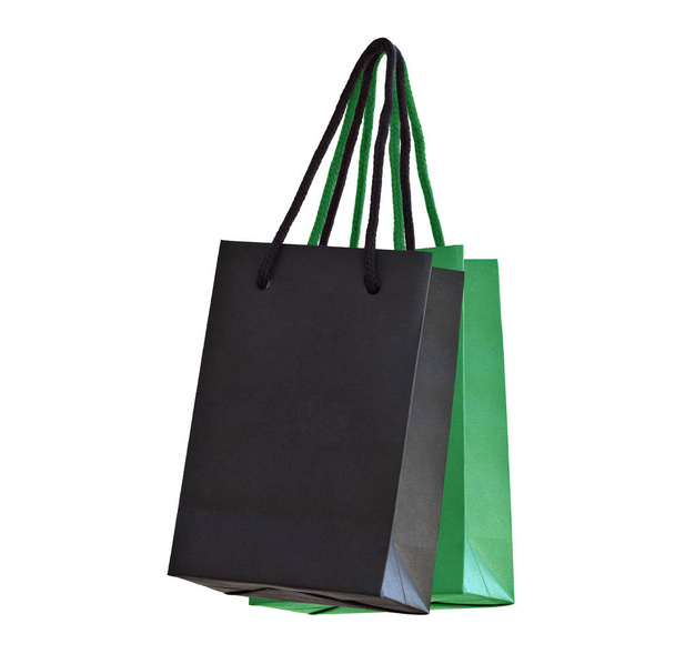 緑と黒の紙のショッピングバッグ. - 写真・画像
