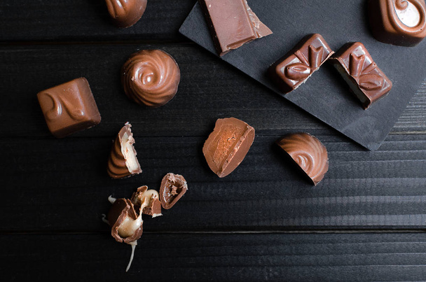 chocolate candies in the different forms and taste - Fotoğraf, Görsel