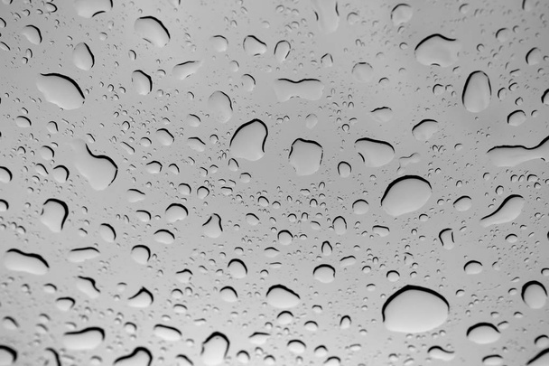 water drop on the glass after raining background - Photo, Image