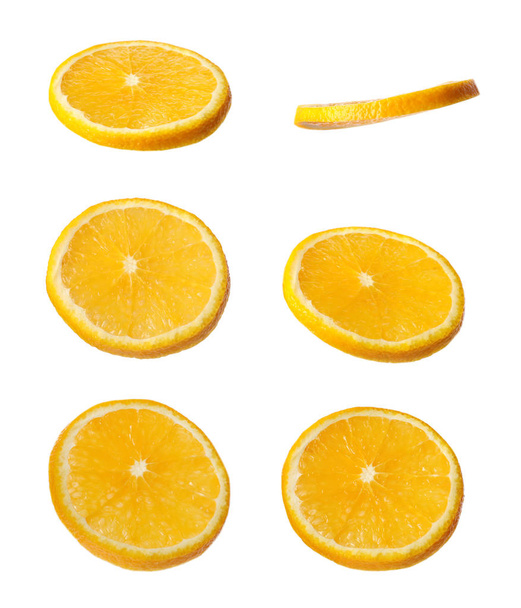 Set of cut fresh juicy orange on white background - Foto, imagen