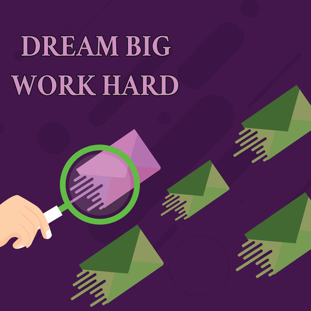 Handwriting text Dream Big Work Hard. Concept meaning Believe in yourself and follow the dreams and goals Magnifying Glass on One Different Color Envelope and others has Same Shade. - Photo, Image