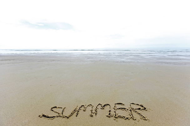 Mar escrito en vacaciones de arena
 - Foto, imagen