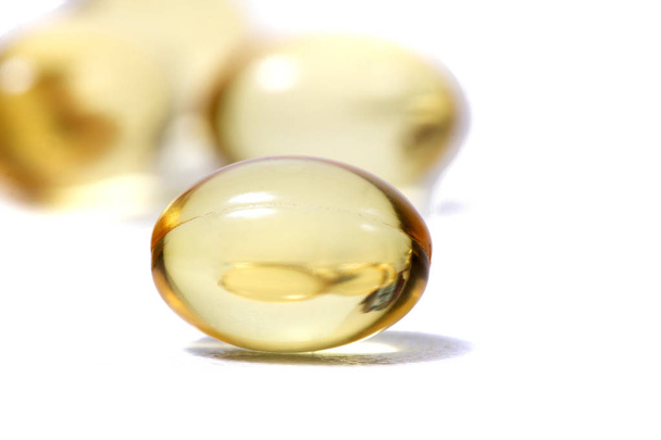 translucid yellow pills - Photo, image