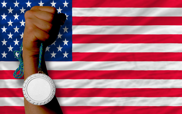 Срібна медаль за спорт і національний прапор Америки
 - Фото, зображення