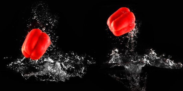 Bell Pepper with Water Splash and Bubble Isolated for Vegetable. Fresh Single Red Pepper Drop in Water. Juicy Red Capsicum Paprika Dropped Falling into Water on Black Background. Wet Motion Action. - Foto, imagen